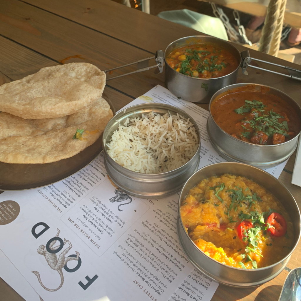 Indian street food bowls with naan bread